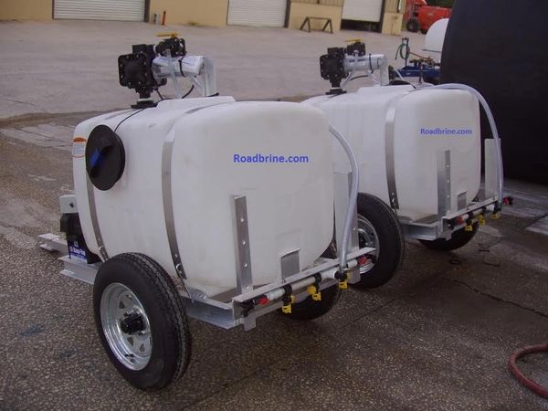 Trailer with tank pump and spray bar